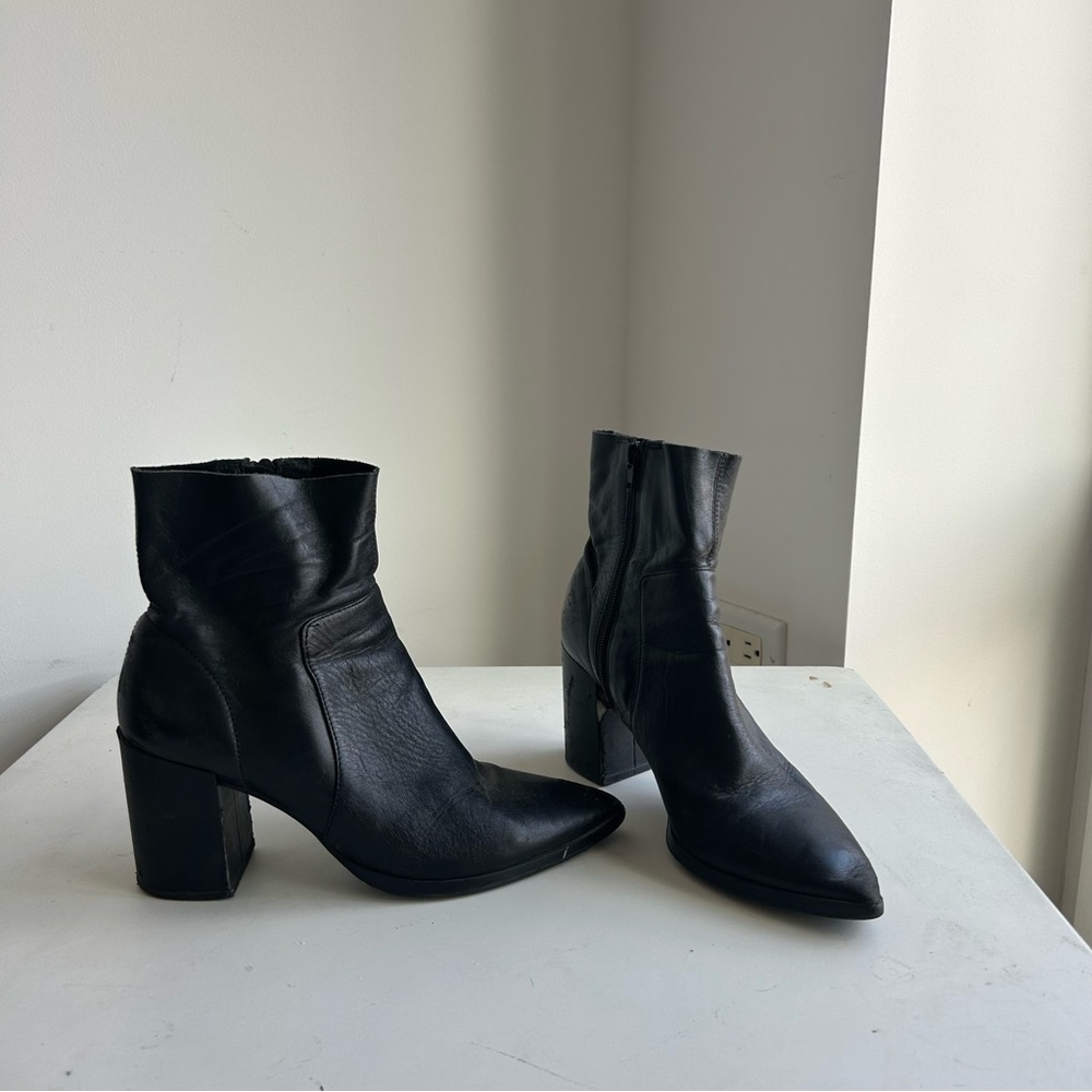 Black Tony Bianco boots.